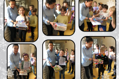 Uczniowie otrzymujący nagrody i dyplomy w świetlicowym  konkursie "Pani Zima"